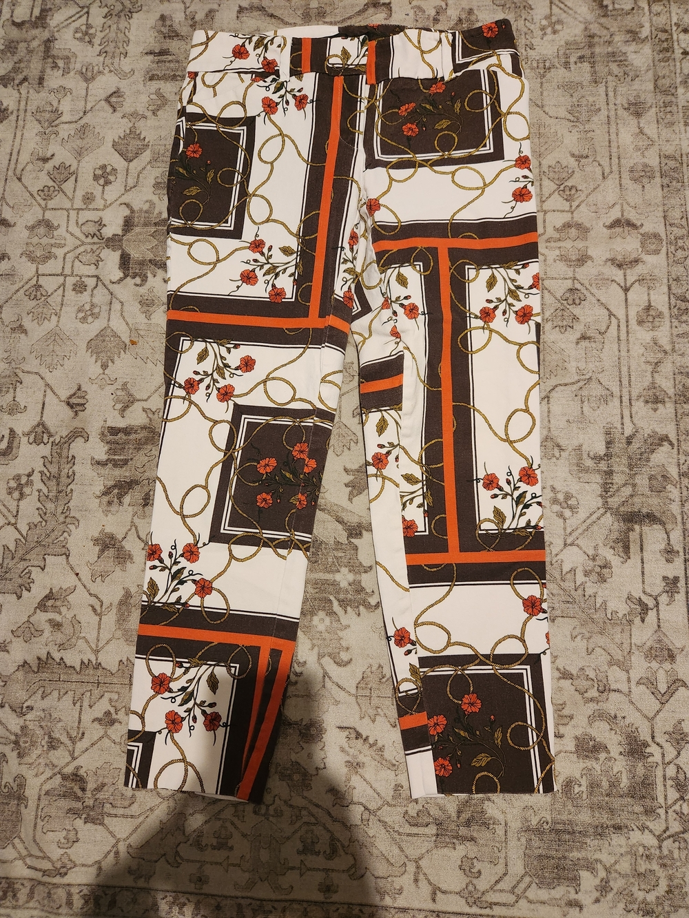 Avenue White Skinny Pants with Black, Orange & Gold Chain Print
